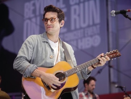 NEW YORK, NY – SEPTEMBER 26: Singer-songwriter John Mayer performs in concert after the press conference about the launch of 2015 Rock In Rio USA 2015 at the event in Times Square on September 26, 2014 in New York City. (Photo by Thos Robinson/FilmMagic) *** Local Caption *** John Mayer