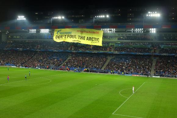 Greenpeace activists unfurl a 28m wide banner reading Gazprom, Dont Foul The Arctic at Basel’s St. Jakob Park stadium, shortly after kick-off in the Champions League game between FC Basel and Gazprom sponsored, FC Schalke 04. The environmental organization demands that Gazprom (the Russian state-owned company and Champions League sponsor) cease their high-risk oil exploration […]