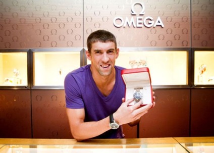 Phelps participa de exposição da Omega em Berlim