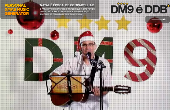 Brinque de compositor em cartão de Natal da DM9DDB