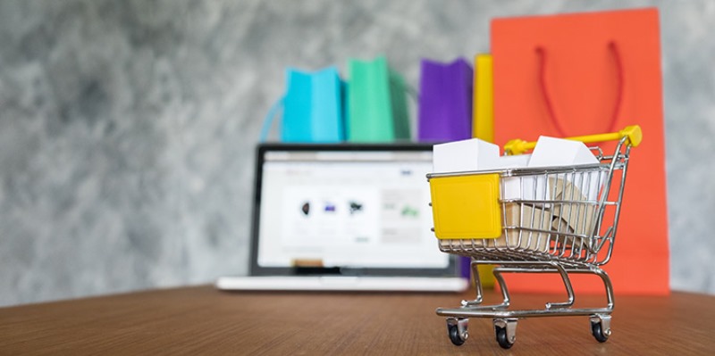 laptop and shopping bags, online shopping concept