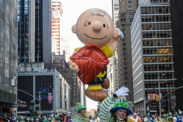 NEW YORK, NY – NOVEMBER 23: The Charlie Brown balloon floats on 6th Ave. during the annual Macy’s Thanksgiving Day parade on November 23, 2017 in New York City. The Macy’s Thanksgiving Day parade is the largest parade in the world and has been held since 1924. (Photo by Stephanie Keith/Getty Images)