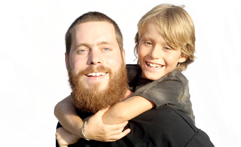 happy family, father and son playing piggyback