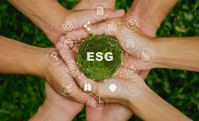 ESG icon concept in the people hand for environmental, social, and governance by using technology of renewable resources to reduce pollution and carbon emission . in sustainable and ethical business on the Network connection