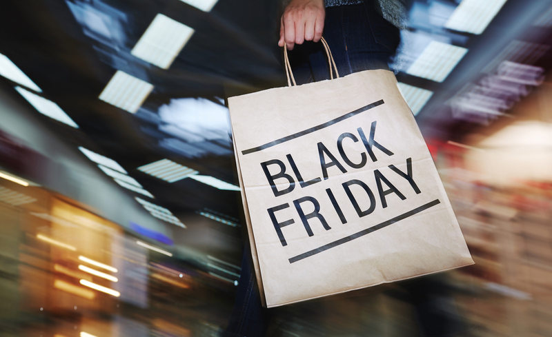 Female shopper visiting mall on Black Friday