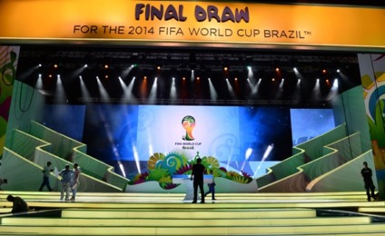 Workers put finishing touches to the stage where the Brazil 2014 FIFA World Cup final draw will take place -next December 6-, in Costa do Sauipe, state of Bahia, on December 2, 2013. AFP PHOTO/VANDERLEI ALMEIDA