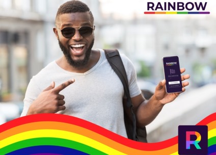 Happy african guy pointing his cellphone with black blank screen