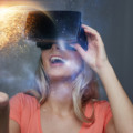 technology, augmented reality and people concept - happy young woman with virtual headset or 3d glasses over planet and space background