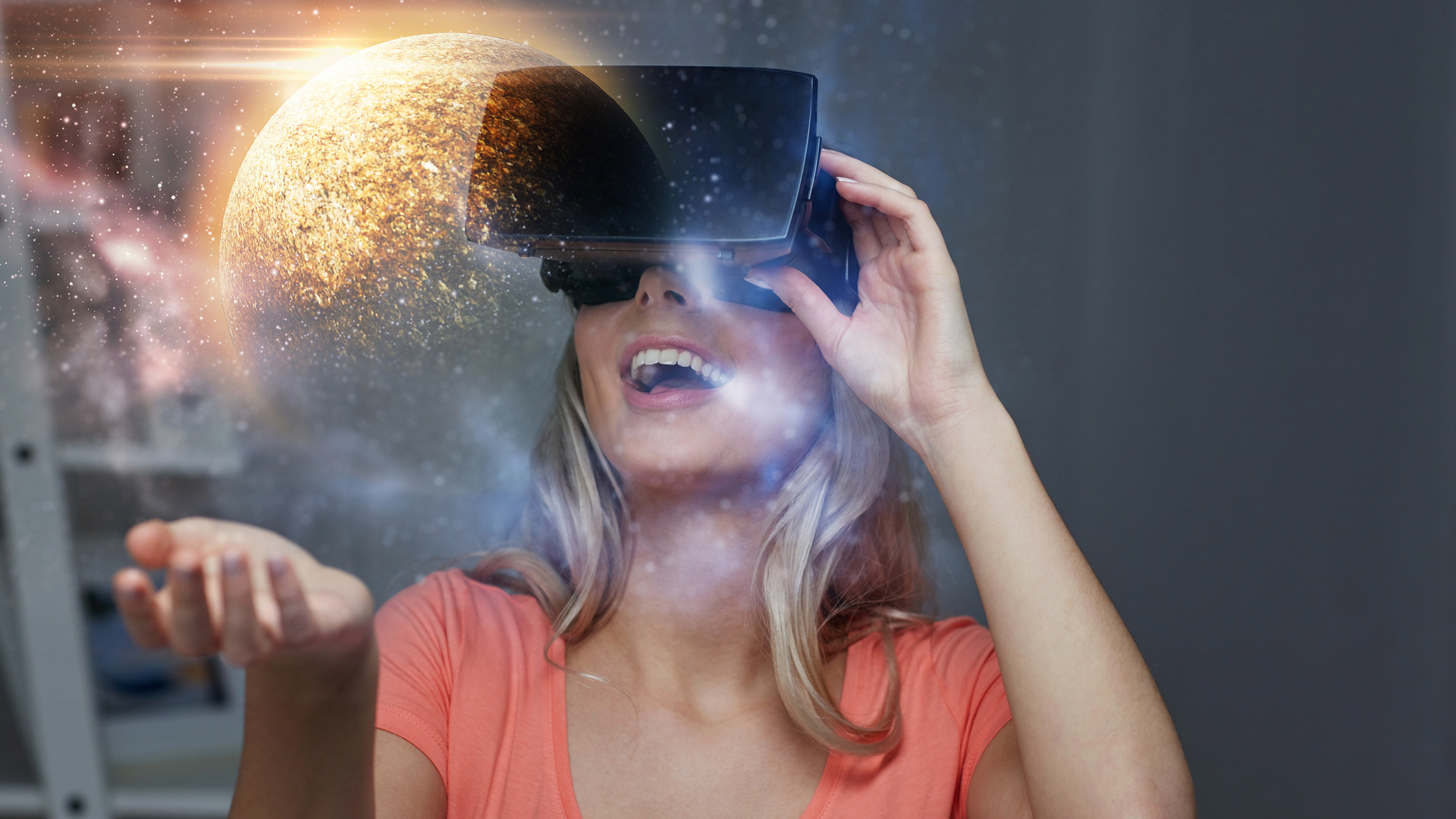 technology, augmented reality and people concept - happy young woman with virtual headset or 3d glasses over planet and space background