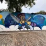 Imagem mostra grafite feito por Léo Araujo, em parceria com a CoSecurity, no Beco do Batman